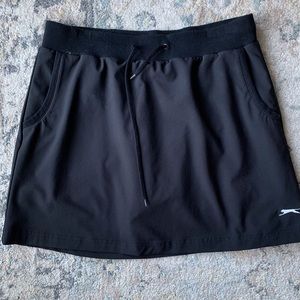 Slazenger golf skort. Black size M